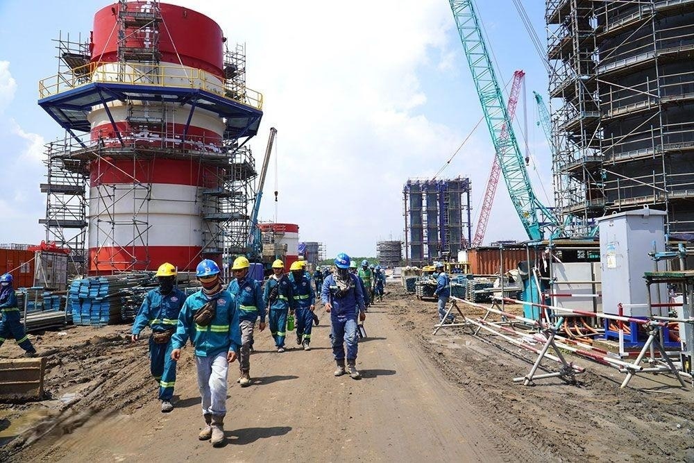 Công nhân lao động trên công trường dự án Điện Nhơn Trạch 3 và 4 Công nhân lao động trên công trường dự án Điện Nhơn Trạch 3 và 4